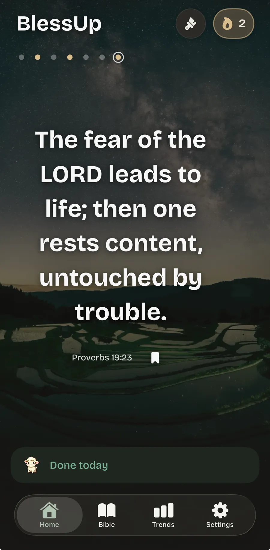 The BlessUp home screen showing Proverbs 19:23 over a night sky, with a two-day streak marker and a done-today card