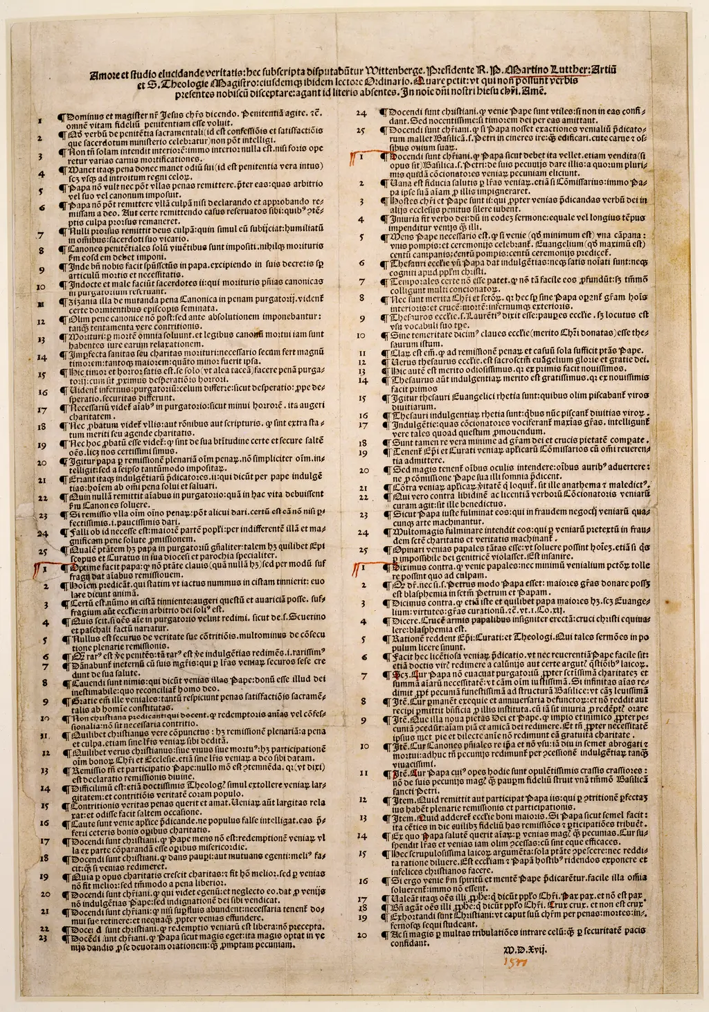A 1517 broadsheet printing of Martin Luther's Ninety-Five Theses, two dense columns of Latin type on aged paper